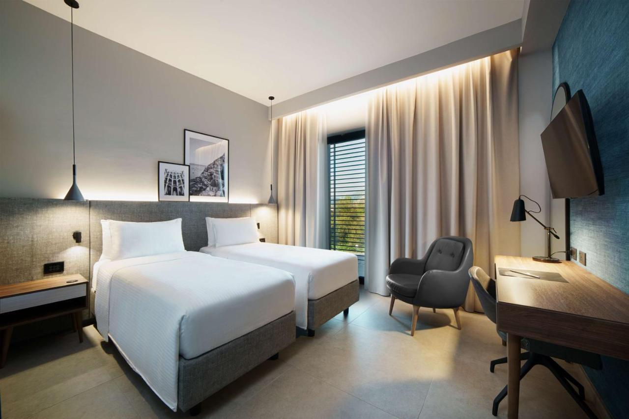 Radisson Hotel Nola Naples Экстерьер фото